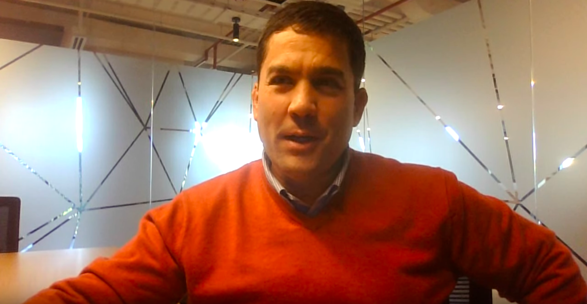 Man in orange sweater